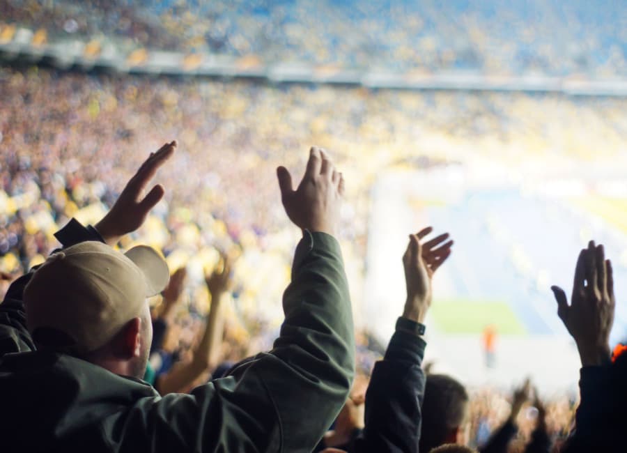 a sports stadium filled with fans 